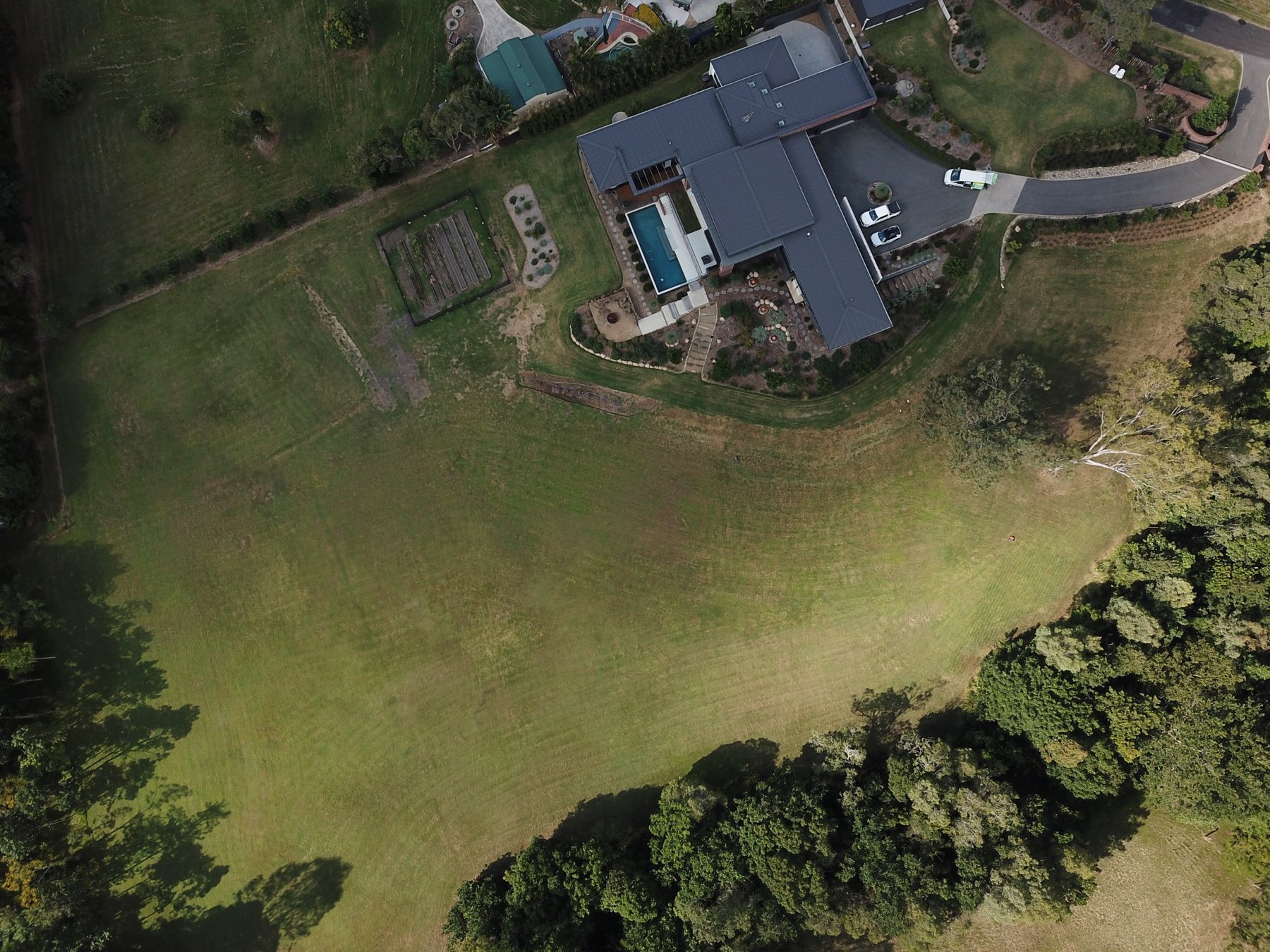 Aerial photo of the finished Camp Mountain property with both mowing work areas